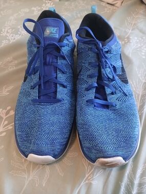 Nike Blue Flyknit Running Sneakers